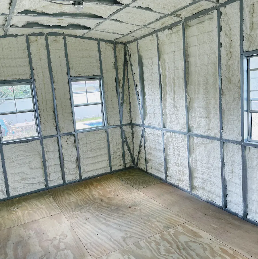 Closed-cell spray foam insulation applied to wall cavities in a residential project in Ellettsville